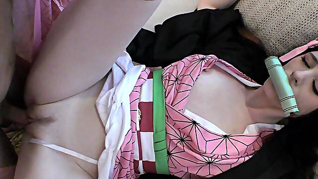 A girl with long hair is being fucked in doggy style