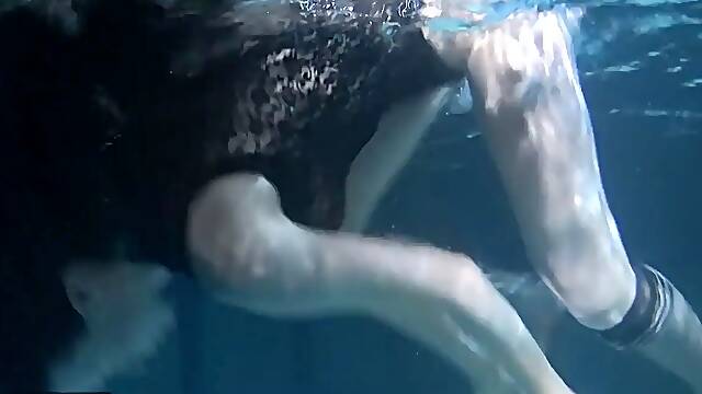 Shaved brunette sissy Irina Polcharova naked in the pool
