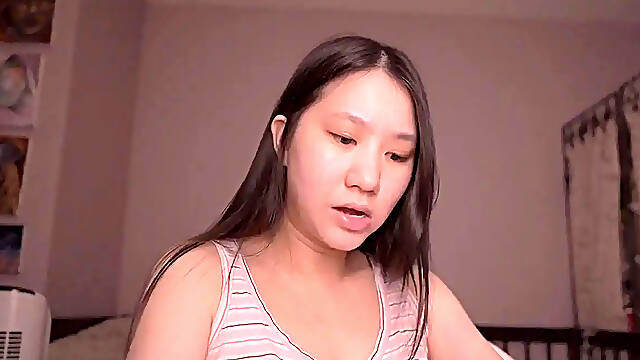 Innocent Chinese girl reads book softly while getting fucked