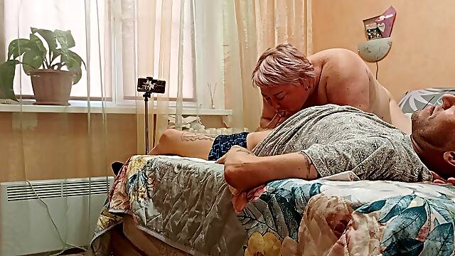 My mother-in-law's mouth works wonders on my dick until it explodes in jizz