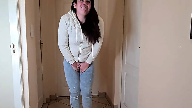 Brunette Slut Desperately Needs to Piss, Pisses in Her Blue Jeans