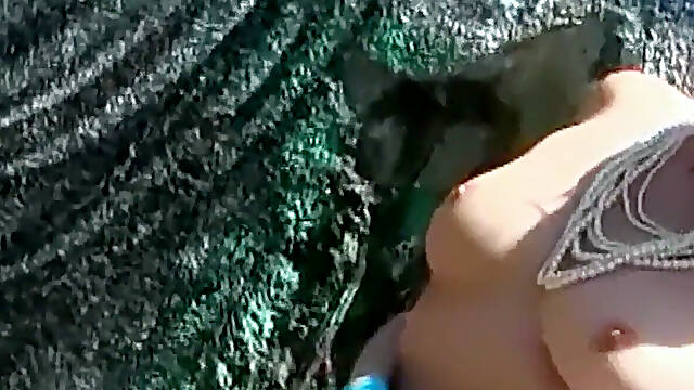 Tattooed Blonde and Her Girlfriend Lick Each Other Outdoors on the Rocks